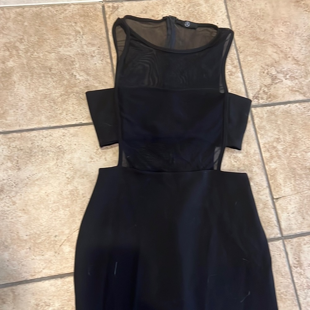 Black evening gown. Paneled long dress.